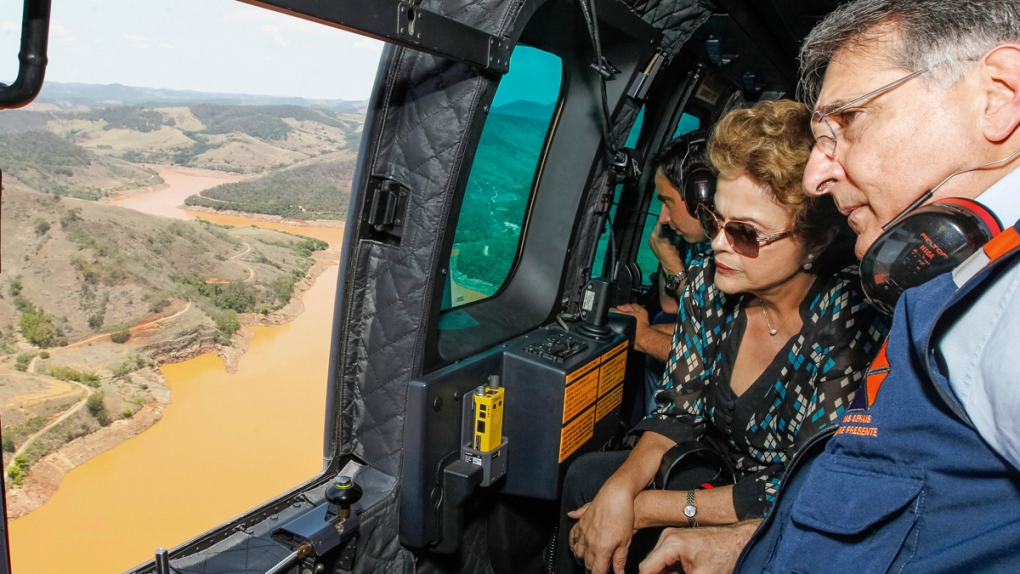 Surveying the breached dam in Minas Gerais, Brazil