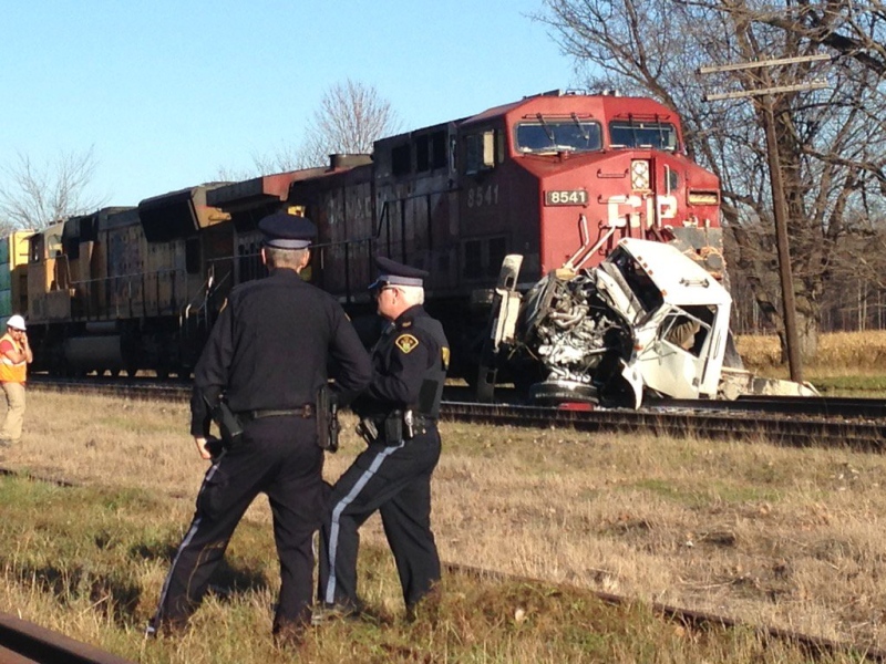 OPP work at the scene of a fatal collision near Bothwell, Ont. on Monday, Nov. 16, 2015. (Chuck Dickson / CTV London)