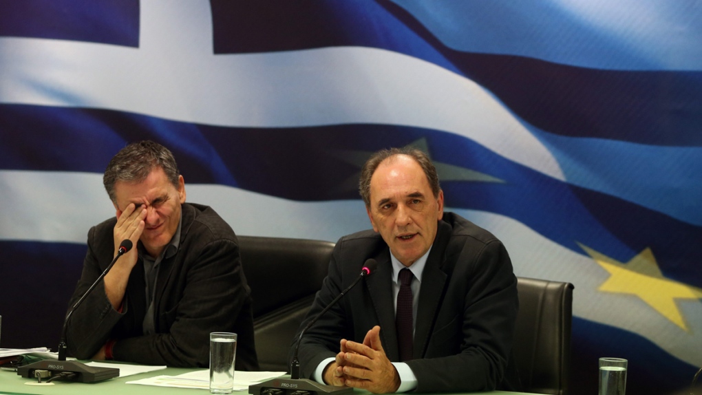 Giorgos Sathakis, right, and Euclid Tsakalotos