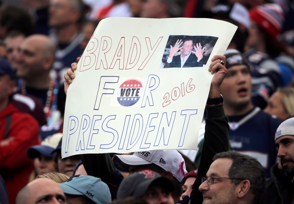 New England Patriots fan with Brady sign 