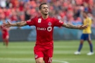 In this Sept. 19, 2015, file photo, Toronto FC's Sebastian Giovinco celebrates after scoring his team's second goal against the Colorado Rapids during the first half of the MLS soccer game in Toronto. (Chris Young / The Canadian Press)