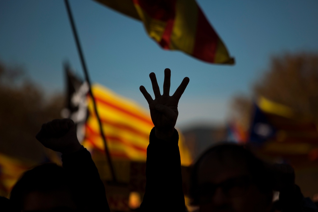 Pro-independence demonstrator with Catalonian flag