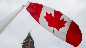 The Canadian flag flies on Parliament Hill, Friday Dec. 4, 2015. (Adrian Wyld/The Canadian Press)