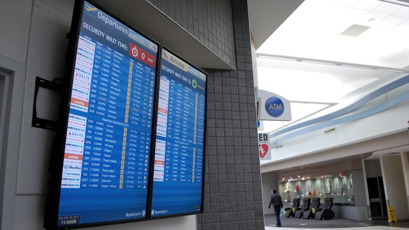 Departure and arrival times are seen here at the Saskatoon John G. Diefenbaker International Airport on the morning of Saturday, Dec. 19, 2015. (Kevin Menz/CTV Saskatoon)