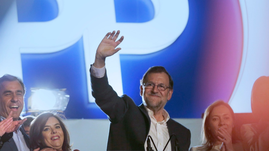 Mariano Rajoy greets supporters in Madrid