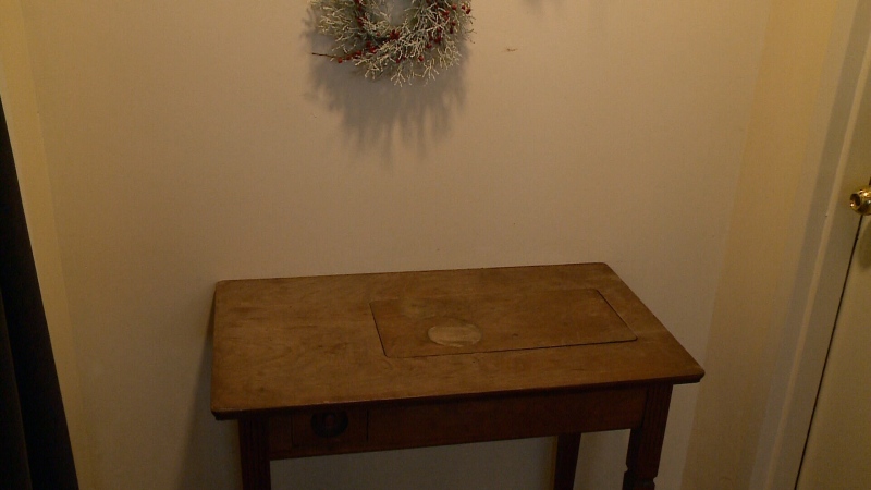 An empty table sits at the back of Cafe Morala in the Glebe, where a nativity scene was stolen from inside the restaurant on Dec. 13, 2015.