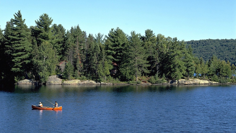 People canoe in Algonquin Provincial Park in Ontario, Canada, in this 2001 photo. (Ontario Tourism 2005 / The Canadian Press)