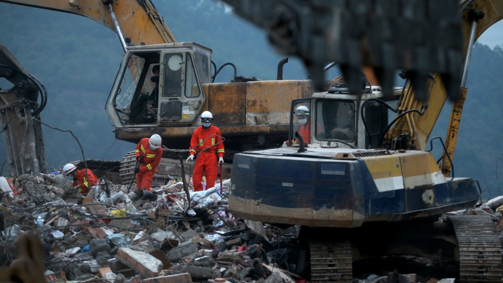 Rescuers search for Shenzhen landslide survivors