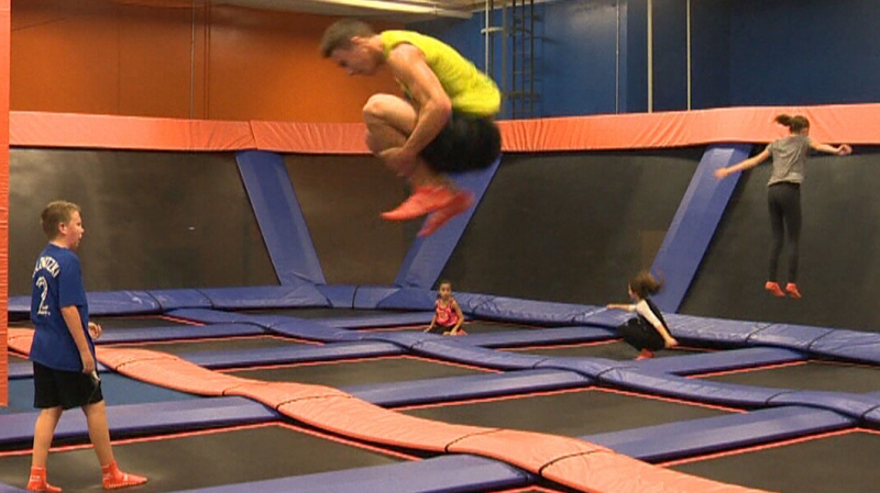 Children are seen jumping on trampolines at a trampoline park. (CTV)