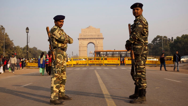 Indian security men guard near the India Gate War 