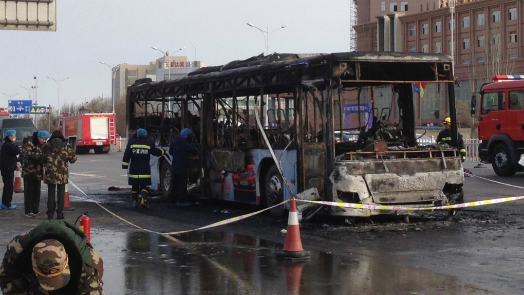 Suspect sought in deadly bus fire in China