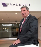 Valeant Pharmaceuticals International chief executive J. Michael Pearson poses for photographers after the company's annual meeting Tuesday, May 19, 2015 in Laval, Quebec. (Ryan Remiorz/THE CANADIAN PRESS)