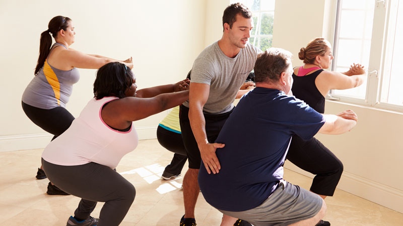 Overweight young adults at fitness class