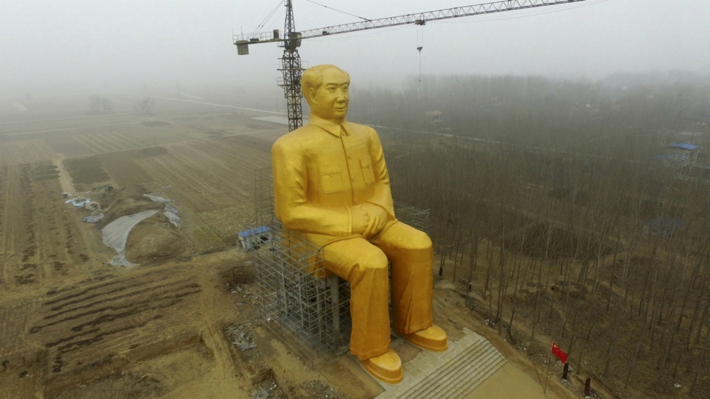 Golden statue of Mao in China