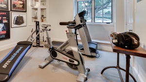 Time is one of the biggest barriers to starting or sticking with your fitness program, so building your own gym at home could be a great solution with so many benefits. (AP Photo/Rogers Healy and Associates Real Estate)