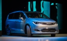 The 2017 Chrysler Pacifica Hybrid minivan is unveiled at the North American International Auto Show, Monday, Jan. 11, 2016, in Detroit. Chrysler claims this hybrid model will do 80 miles per gallon. (AP Photo/Tony Ding)
