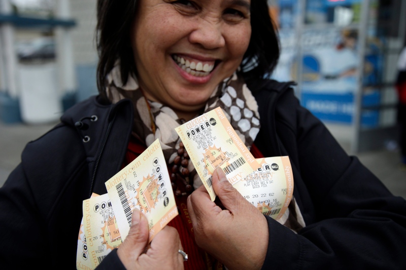 Zaida Cobangbang, of Union City, Calif., shows her Powerball tickets shortly after buying them Saturday, Jan. 9, 2016, in San Lorenzo, Calif. (AP / Marcio Jose Sanchez)