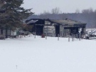 The remains of a barn where 13 horses were killed in a fire is seen near Mount Forest, Ont. on Friday, Jan. 15, 2016. (Scott Miller / CTV London)