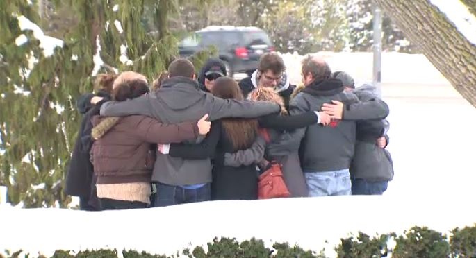 Friends and family of Nicole Wagler embrace