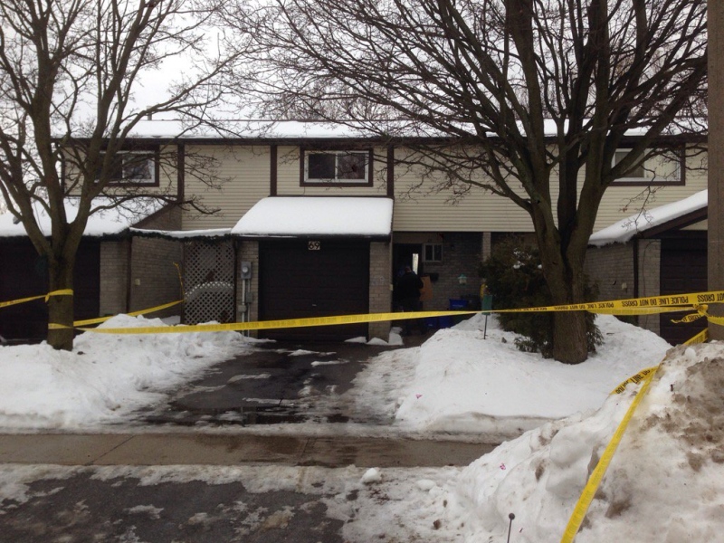 Police tape surrounds a home, where Barrie police say a double homicide took place in Barrie, Ont. on Tuesday, Jan. 26, 2016. (Rob Cooper/ CTV Barrie)