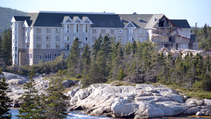 The Aspotogan Spa is demolished in a Sept., 2015 handout photo. It was meant to be a beacon of luxury amid the charming fishing villages that dot Nova Scotia's pristine South Shore. Instead, for more than 20 years, the Aspotogan Sea Spa sat abandoned atop a coastal cliff west of Halifax, its decaying hulk earning a reputation as one of the creepiest places in Canada until the unfinished resort's last wall came crashing down last month. (THE CANADIAN PRESS/HO- LighthouseNOW Progress-Bulletin-Keith Corcoran)
