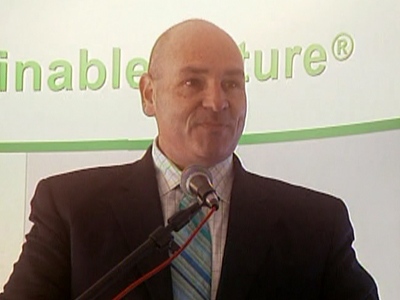 Ontario Energy Minister George Smitherman speaks at an event promoting wind energy as a source of renewable power.