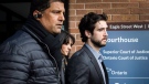 Marco Muzzo (right) leaves the Newmarket courthouse surrounded by family on Thursday, Feb. 4, 2016. (The Canadian Press/Christopher Katsarov)