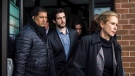 Marco Muzzo (centre) leaves the Newmarket courthouse surrounded by family members including his mother Dawn Muzzo (right) on Thursday, February 4, 2016. Muzzo was released on bail after pleading guilty to a fatal drunk driving crash resulting in the deaths of three children and their grandfather. THE CANADIAN PRESS/ Christopher Katsarov