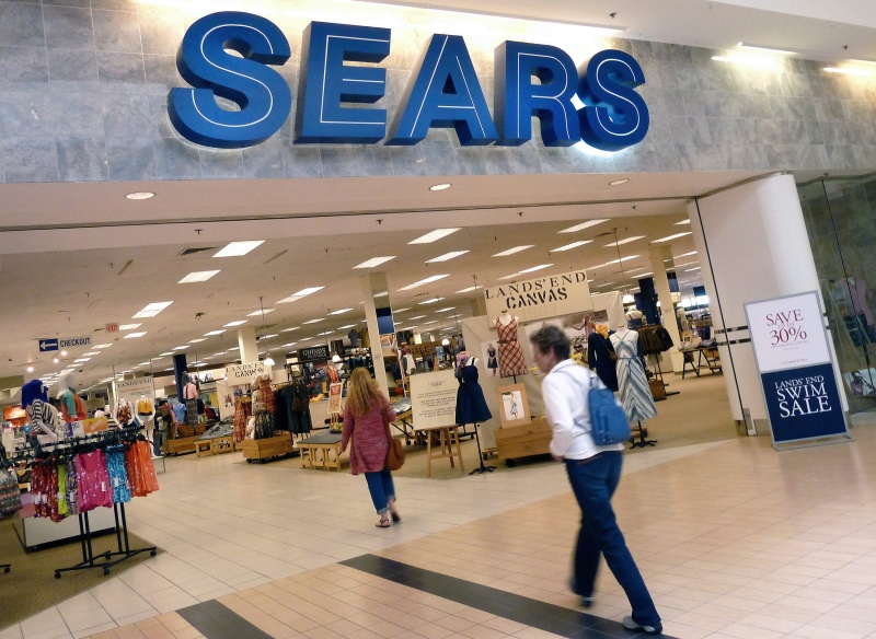 In this May 14, 2012 file photo, shoppers walk into Sears in Peabody, Mass. (AP/Elise Amendola)