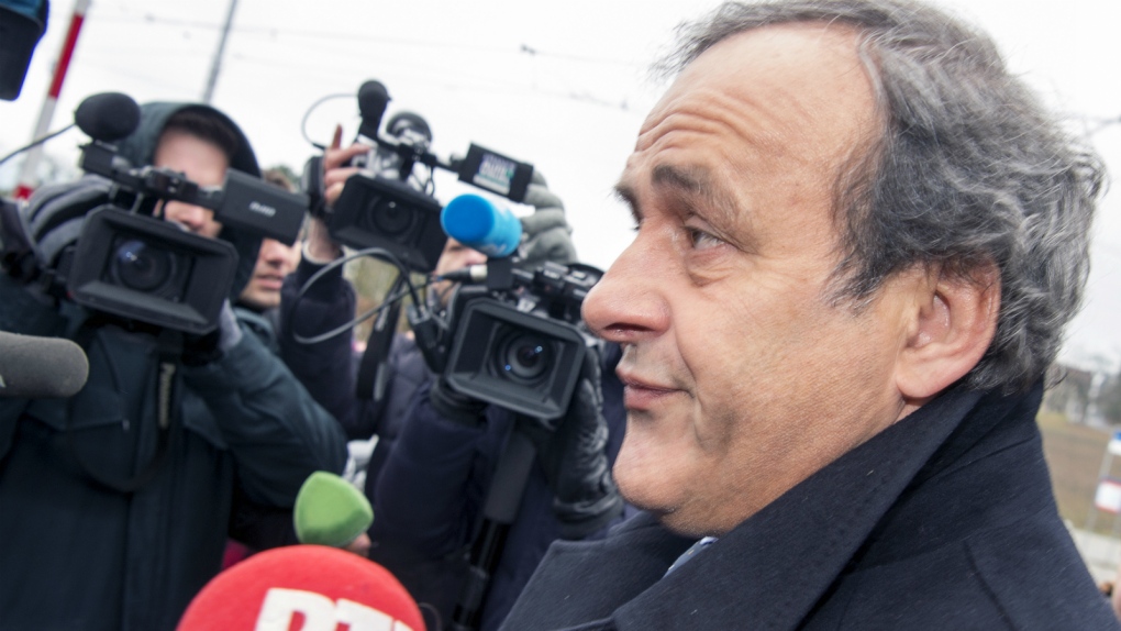 Michel Platini arrives at FIFA headquarters