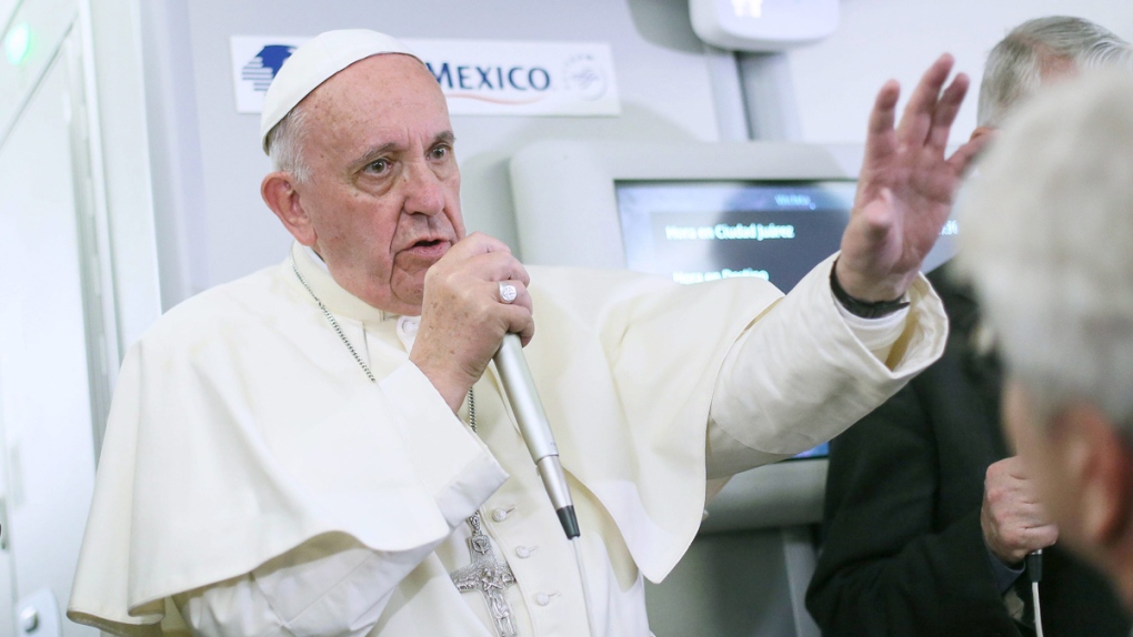 Pope Francis during a flight from Mexico to Italy