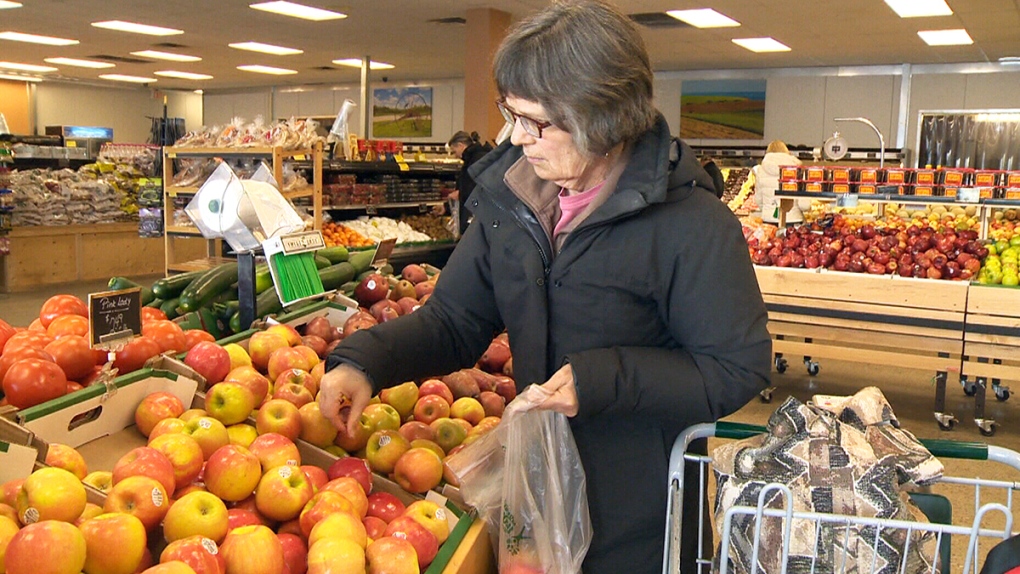 People shop for groceries in Edmonton