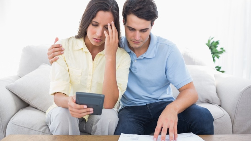 A survey found many Canadians say debt plays a significant role on whether they enter or stay in a relationship. (wavebreakmedia/shutterstock.com)