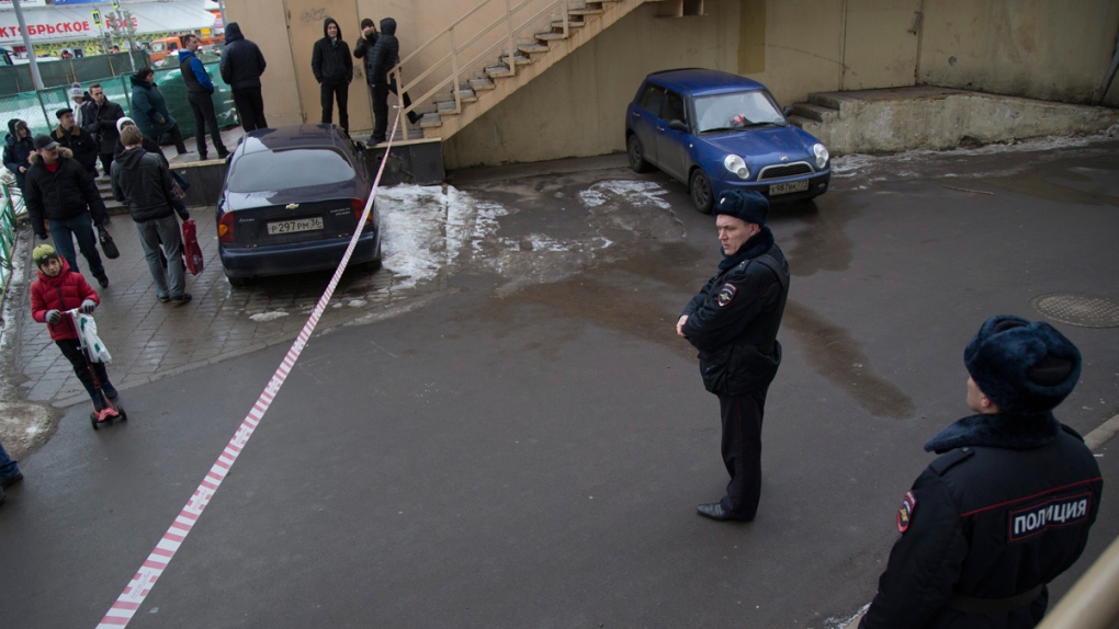 Russian police officers secure the area