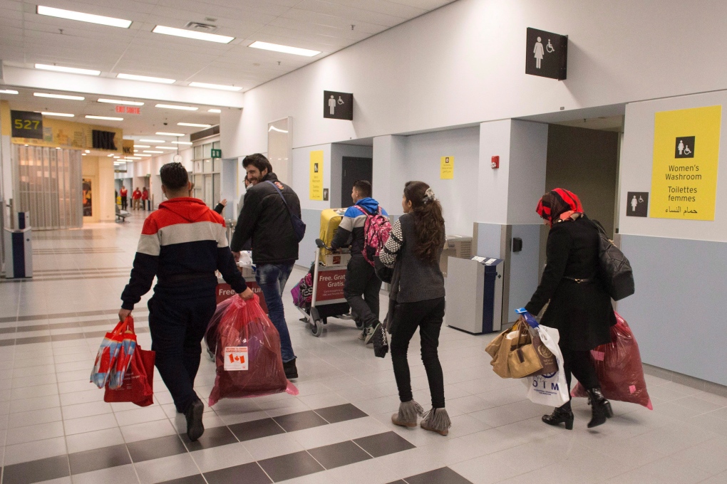 Syrian refugees arrive in Toronto