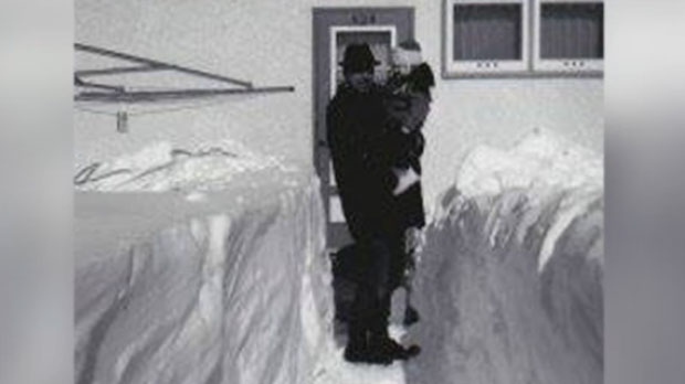The back lane of the Ryz's home on Dunrobin Avenue is piled high with snow the day after the blizzard hit on March 5, 1966. (Photo Louisa Ryz)