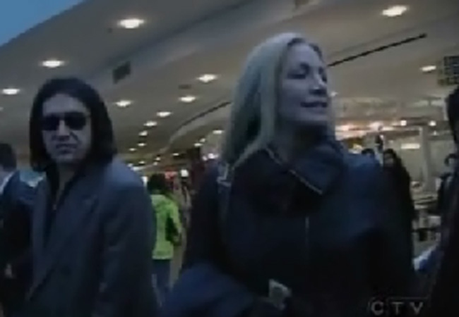 Gene Simmons and his family arrive at Vancouver International Airport, Monday.