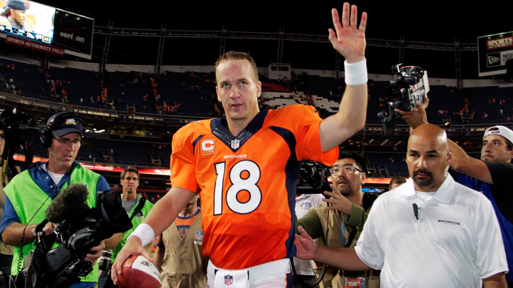 Peyton Manning walks off the field in Denver