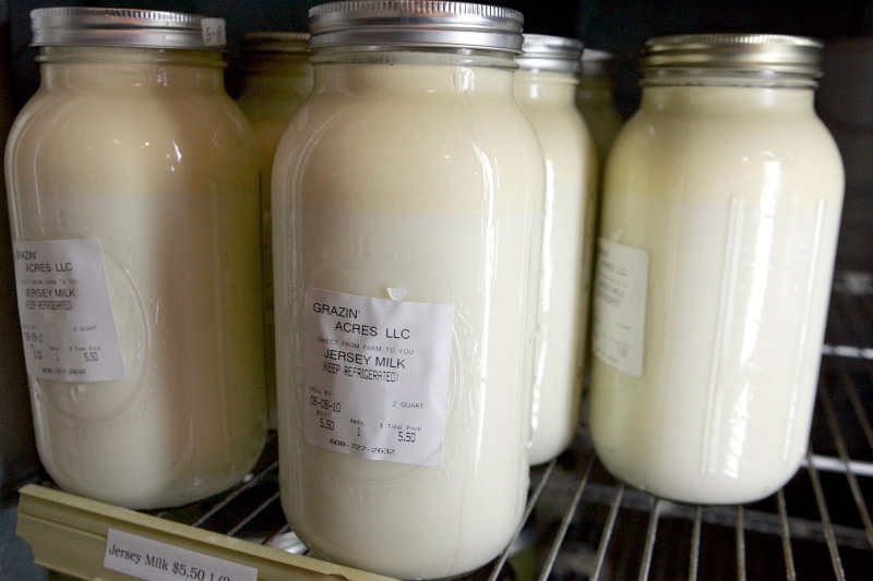 In this file photo, bottles of raw milk are shown in Loganville, Wis., on June 3, 2010. (AP / Wisconsin State Journal, Kyle McDaniel)