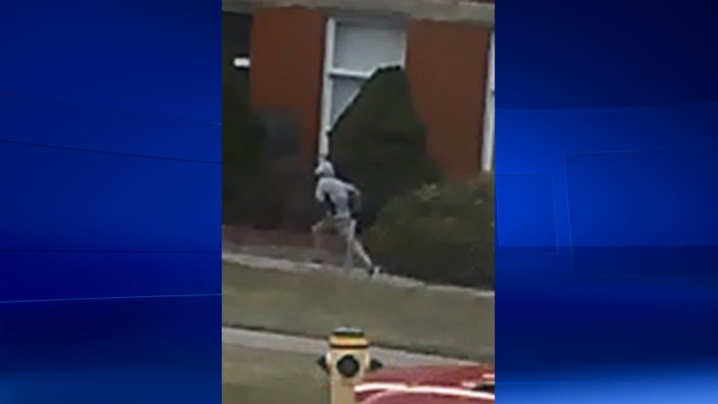 A suspect fleeing from the scene of a robbery in downtown St. Thomas is caught on camera. (Courtesy: St. Thomas Police)