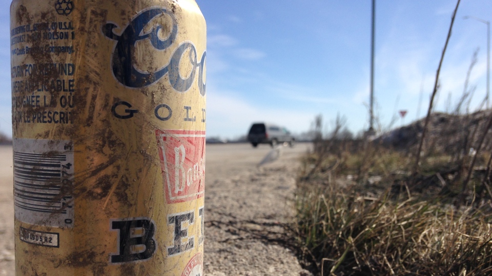 A beer can tossed on the side of the highway can be seen in Innisfil, Ont. on Saturday, March 12, 2016. (K.C. Colby/ CTV Barrie)