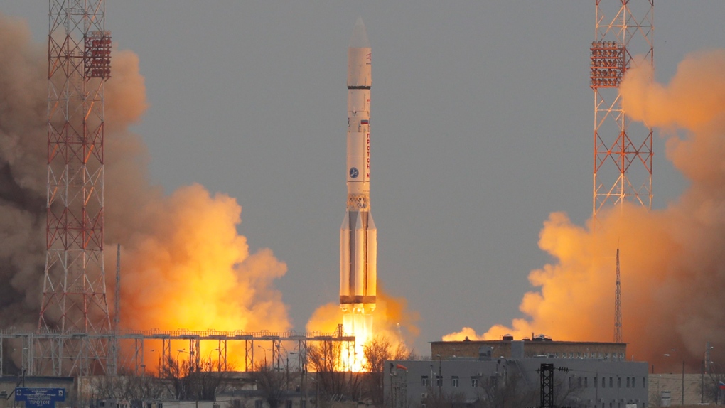 Proton-M rocket booster blasts off