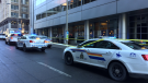 An RCMP officer was rushed to hospital Thursday morning after sustaining self-inflicted injuries inside a federal building at 90 Sparks Street.