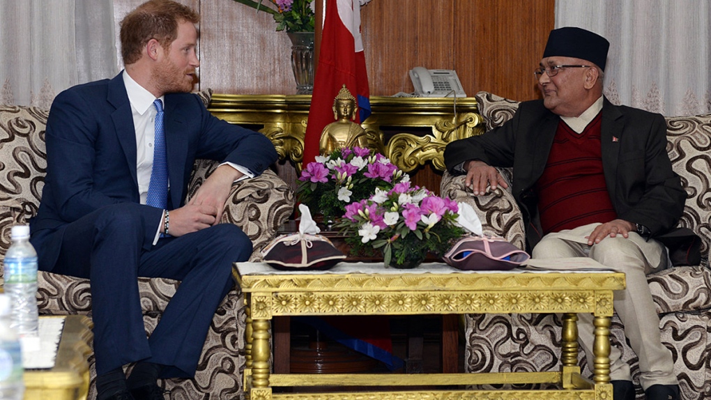 Prince Harry speaks with prime minister of Nepal