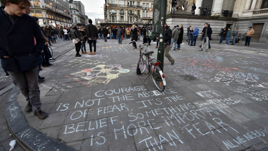 Brussels residents mourn victims of attacks