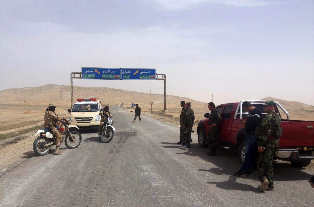 Syrian soldiers at Palmyra entrance