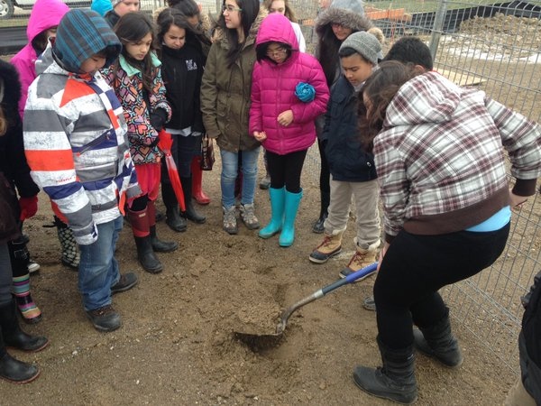 Grade 6 students on hand for the groundbreaking of the new St. John French Immersion School in London, Ont., on Wednesday, April 6, 2015. (Gerry Dewan / CTV London)