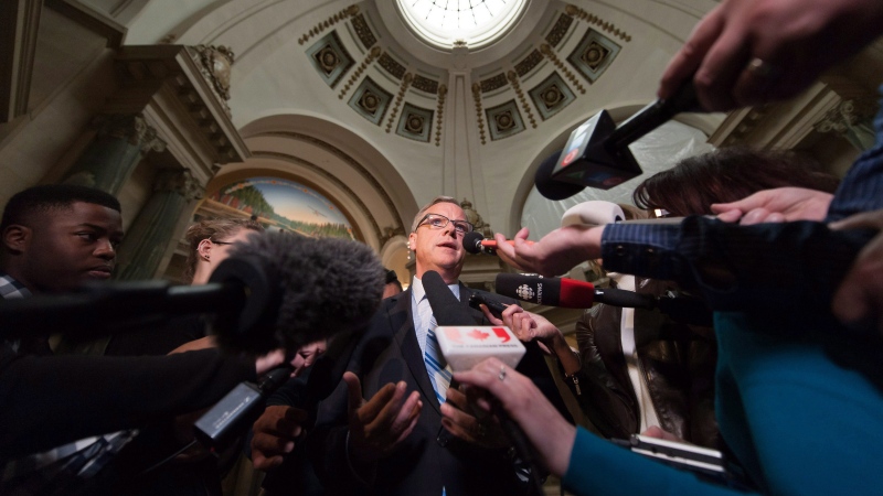 Brad Wall speaks to media one day after the Saskatchewan Party's electoral victory at the Legislative Building in Regina on Tuesday April 5, 2016. THE CANADIAN PRESS/Michael Bell