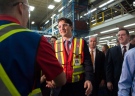Prime Minister Justin Trudeau shakes hands with a Magna employee as he tours the Magna Polycon Industries plant in Guelph on Thursday, April 14, 2016. (THE CANADIAN PRESS / Hannah Yoon)