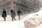 Pedestrians struggle through the snow in downtown Toronto Thursday, Jan. 14, 1999. The city had been crippled by storms and was still bracing for more. (THE CANADIAN PRESS / Kevin Frayer)